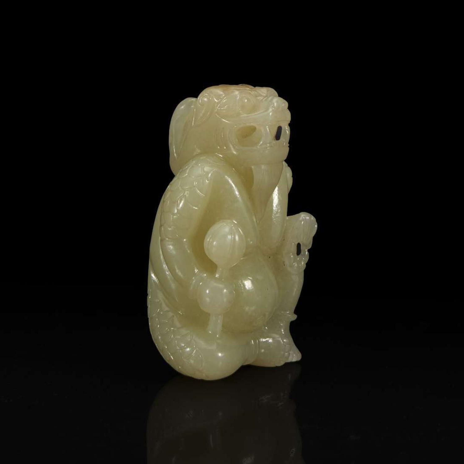A Chinese Yellowish-pale celadon Jade Mythical Creature 黄玉雕瑞兽