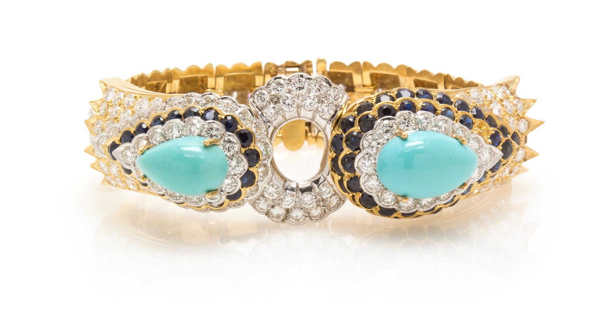 A Vintage Two Tone Gold, Turquoise, Diamond and Sapphire Bracelet, 43.80 dwts.