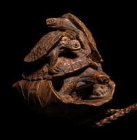 A Japanese Terrapin-Form Boxwood Three- Case Inro, Ojime and Netsuke