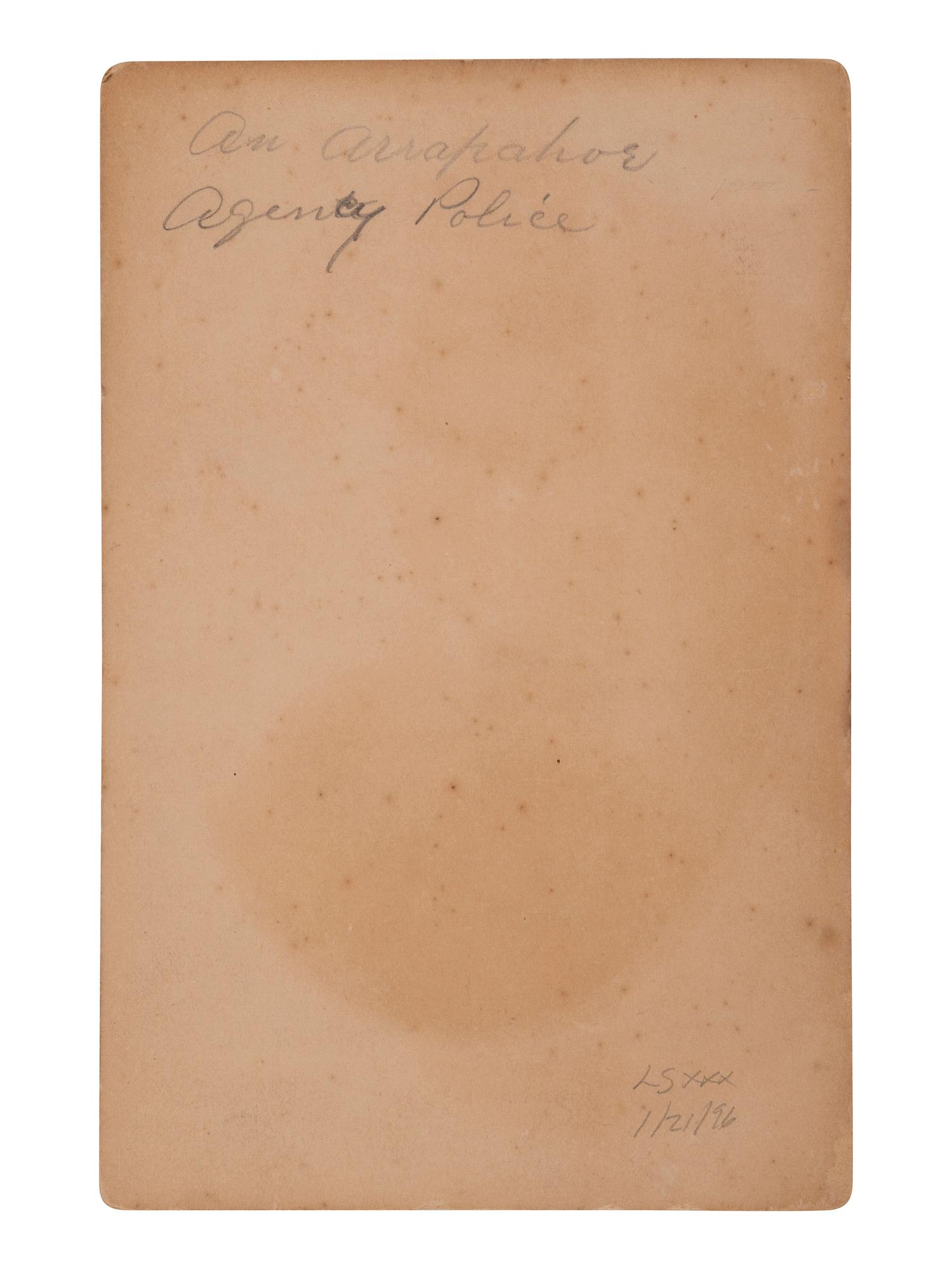 [NATIVE AMERICANS]. Cabinet card of an Arapahoe agency police officer. Fort Reno, Indian Territory: C.C. Stotz.