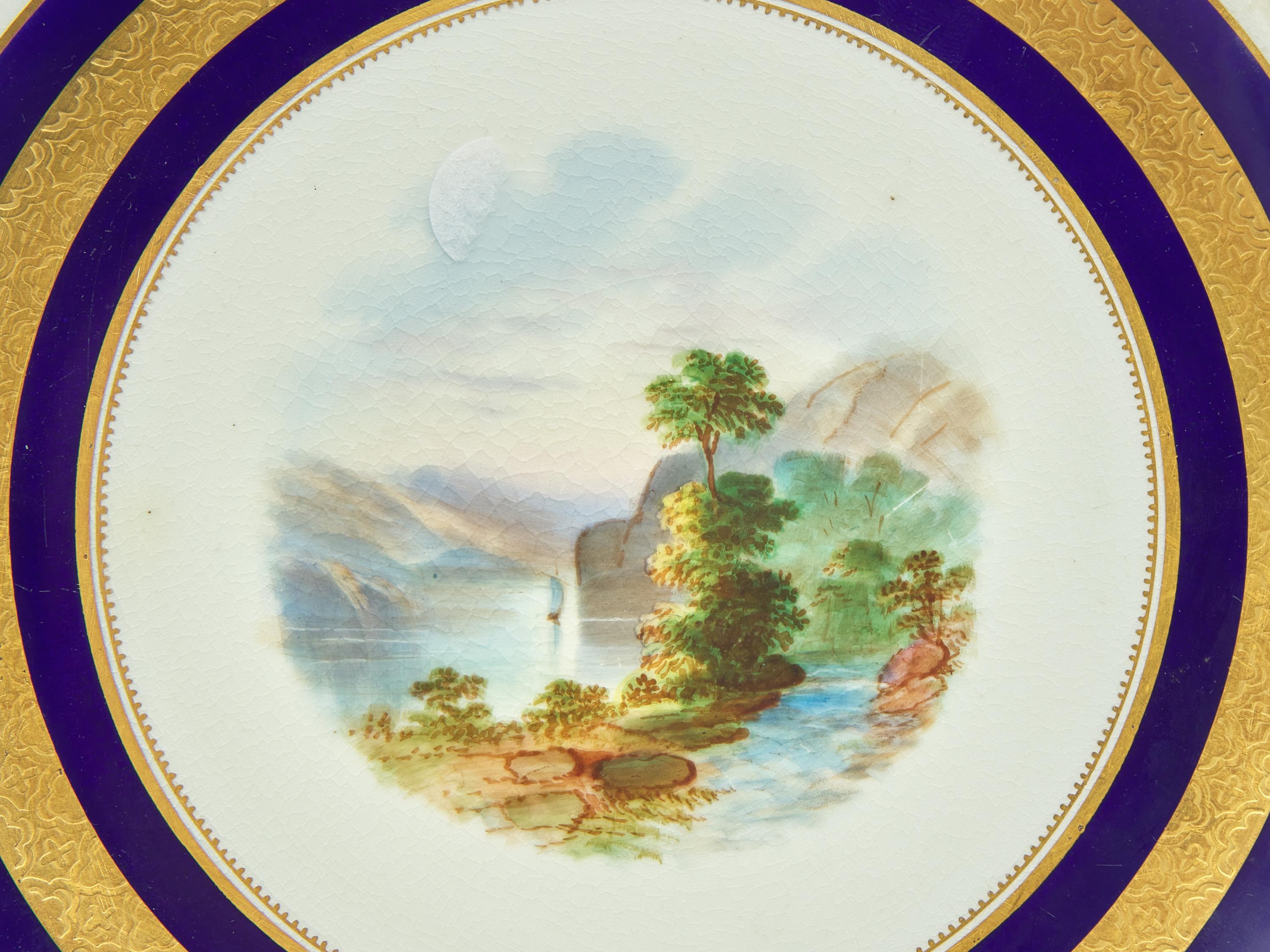 A Set of Nine Continental Gilt-Decorated Porcelain Cabinet Plates