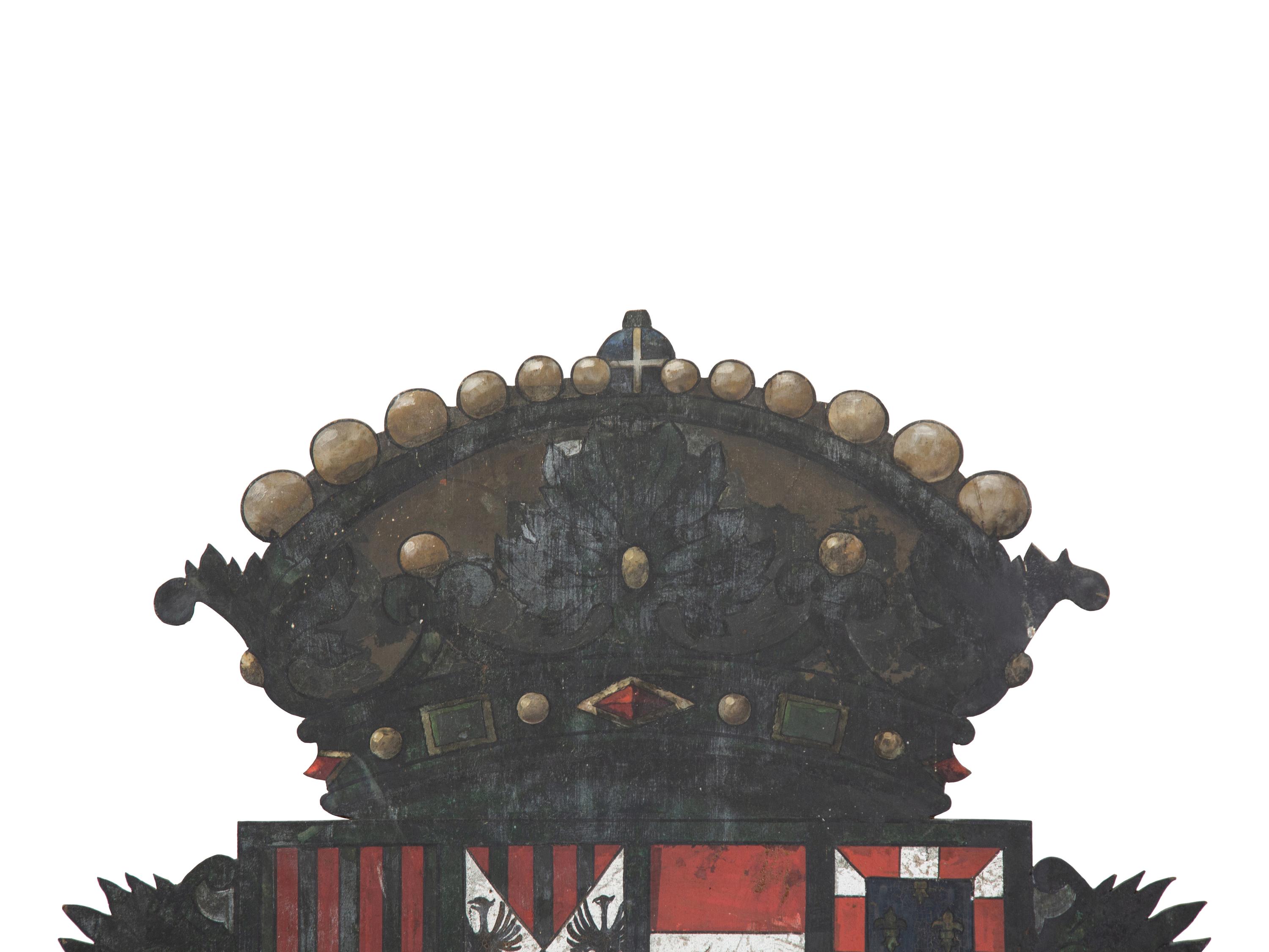 An Italian Painted Wood Armorial Panel