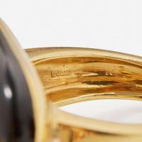 An 18K Yellow Gold, Black Pearl, and Diamond Ring