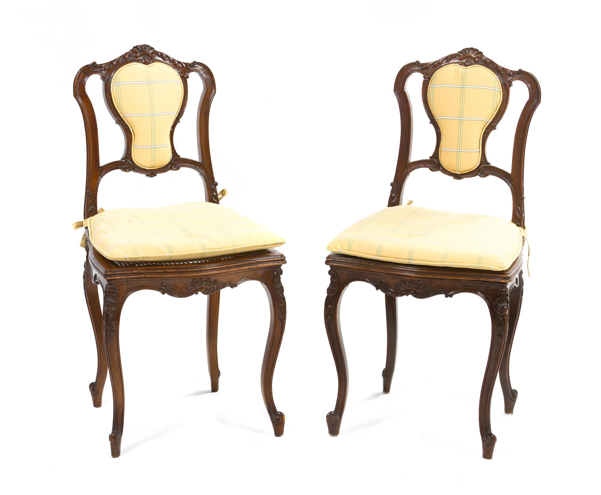 A Pair of Louis XV Style Walnut Side Chairs, Height 35 1/4 inches.