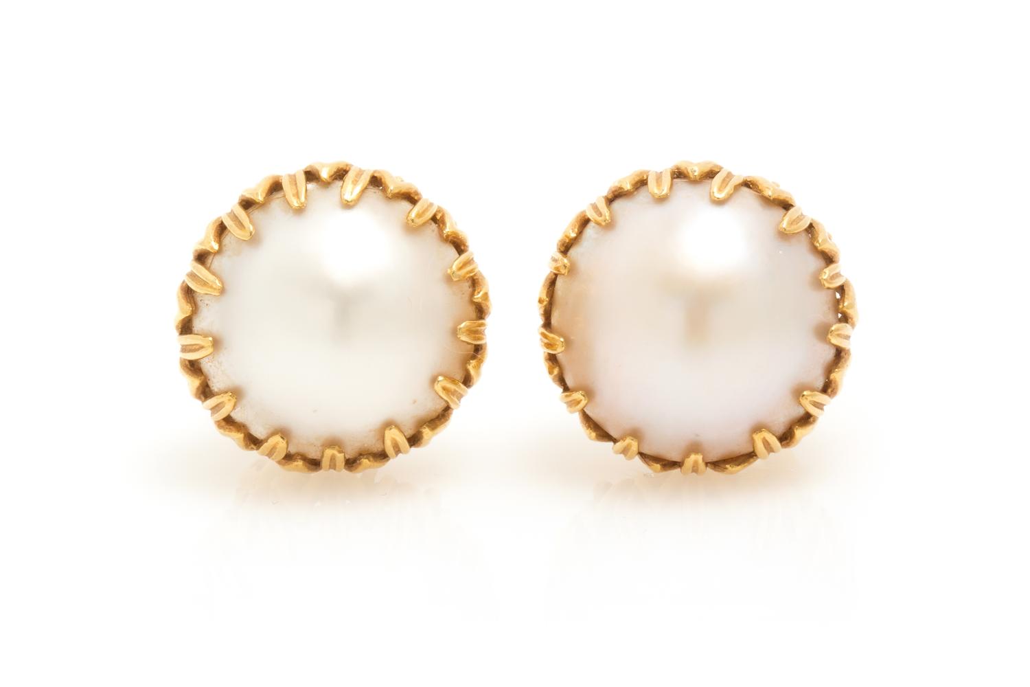 A Pair of 18 Karat Yellow Gold and Mabe Pearl Earclips, 10.40 dwts.