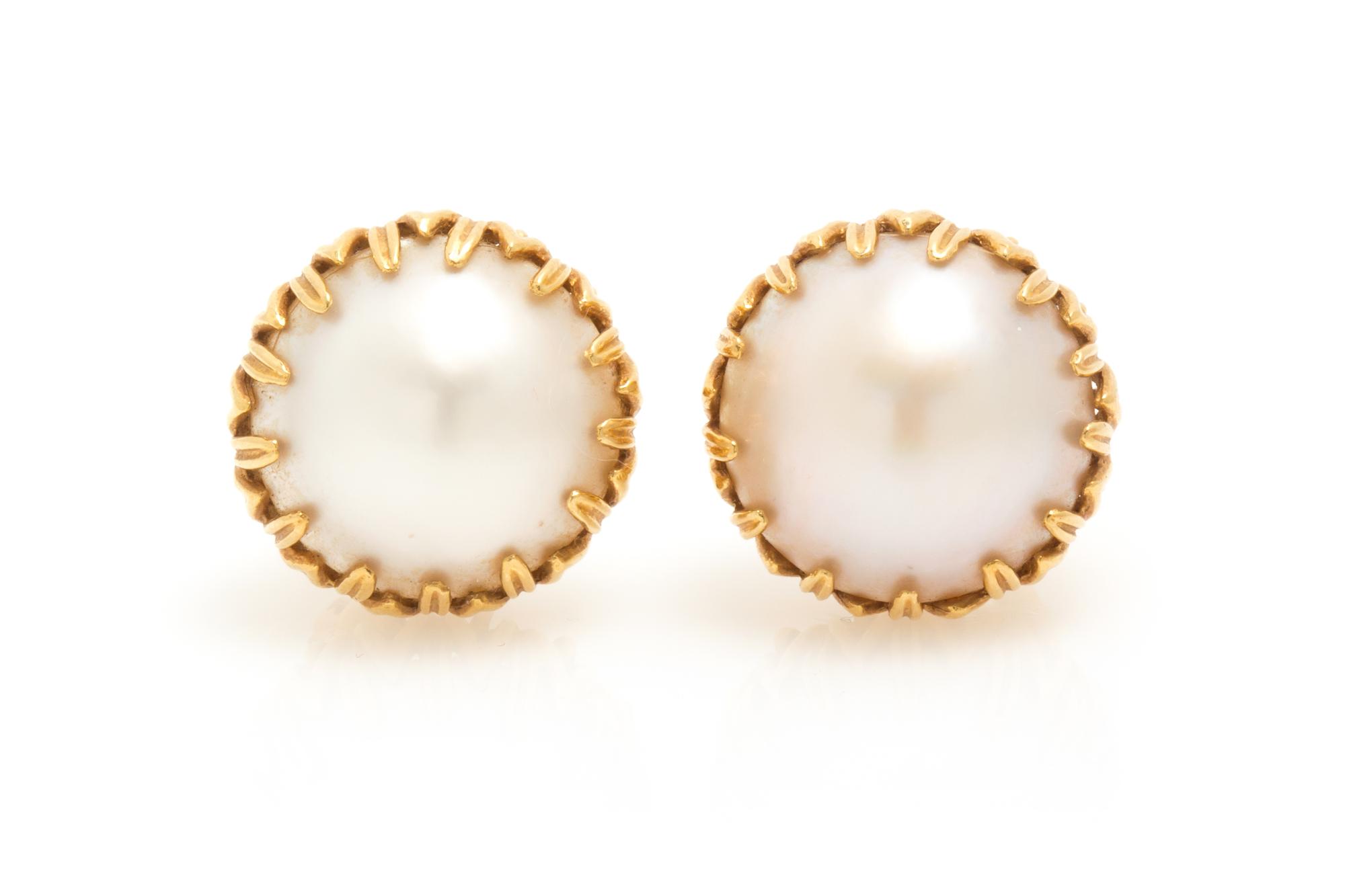 A Pair of 18 Karat Yellow Gold and Mabe Pearl Earclips, 10.40 dwts.