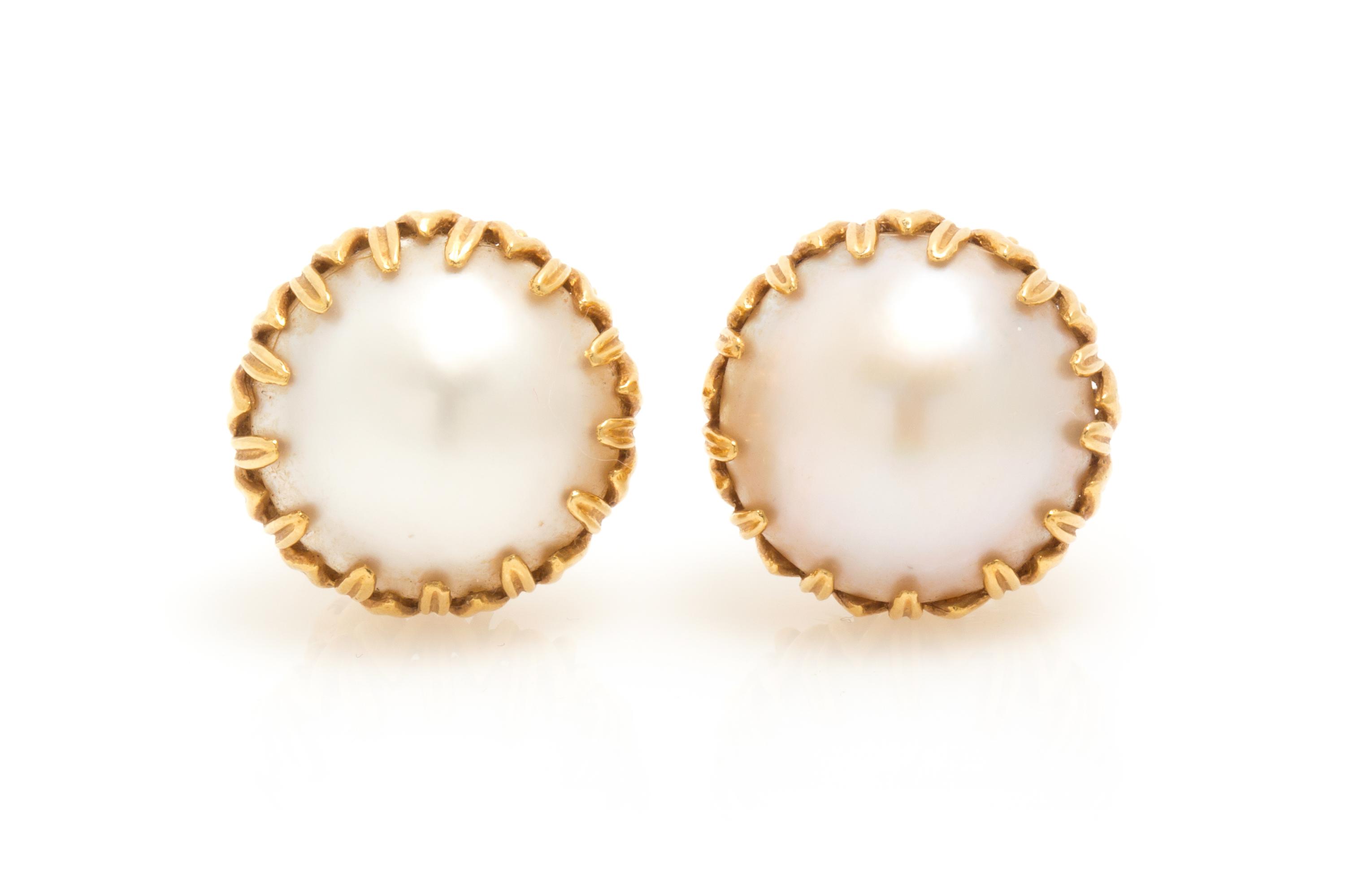 A Pair of 18 Karat Yellow Gold and Mabe Pearl Earclips, 10.40 dwts.