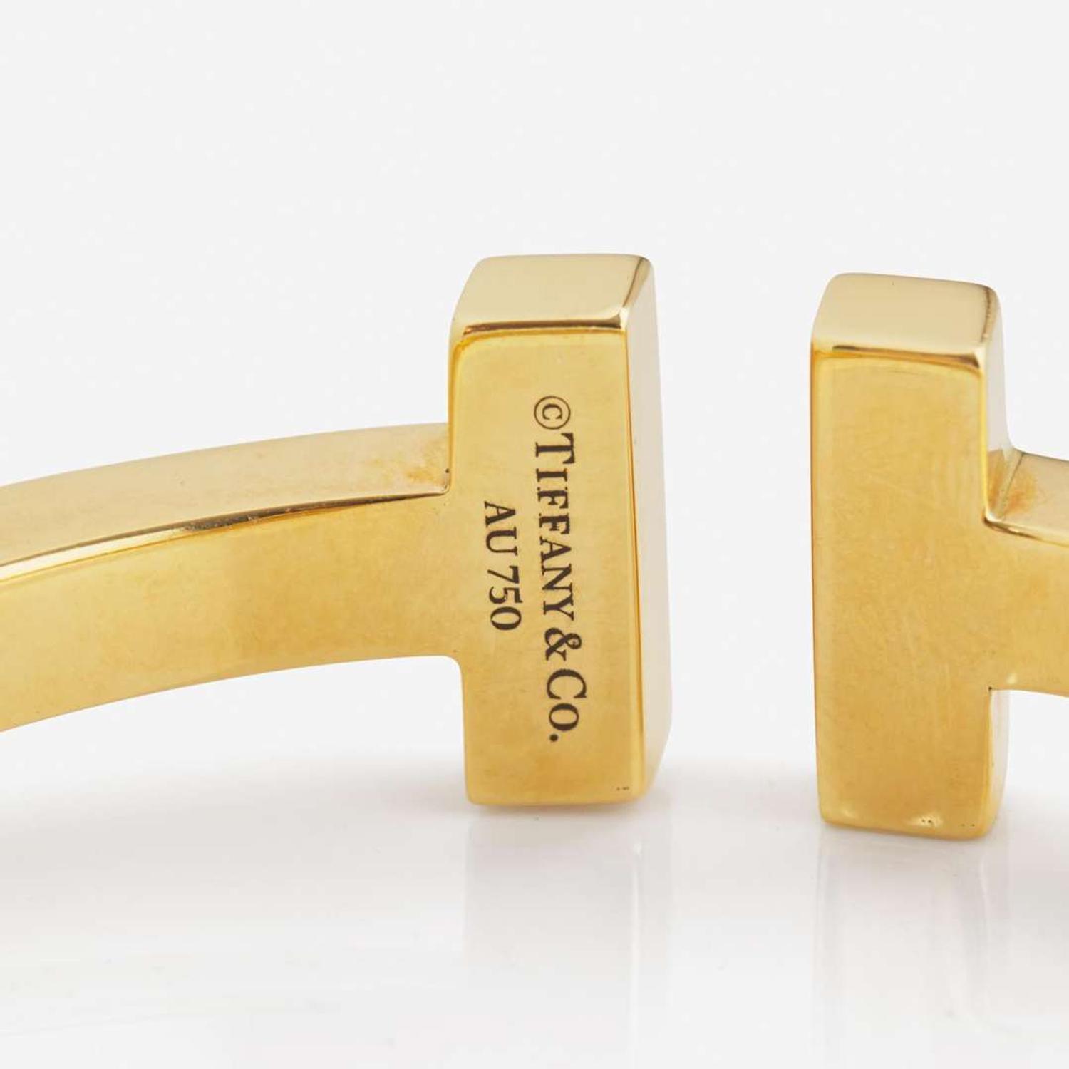 An 18K Yellow Gold " T" Bracelet by Tiffany & Co.