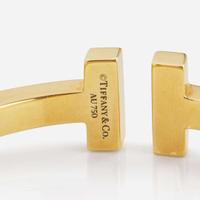 An 18K Yellow Gold " T" Bracelet by Tiffany & Co.