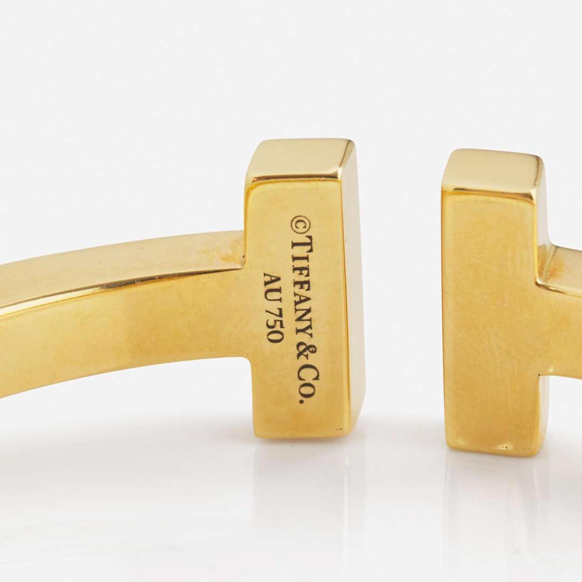 An 18K Yellow Gold " T" Bracelet by Tiffany & Co.