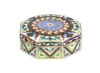 A Russian Enameled Gilt-Silver Pill Box, 11th Artel, Moscow, 1908-1926, of octagonal form with polychrome floral decoration.