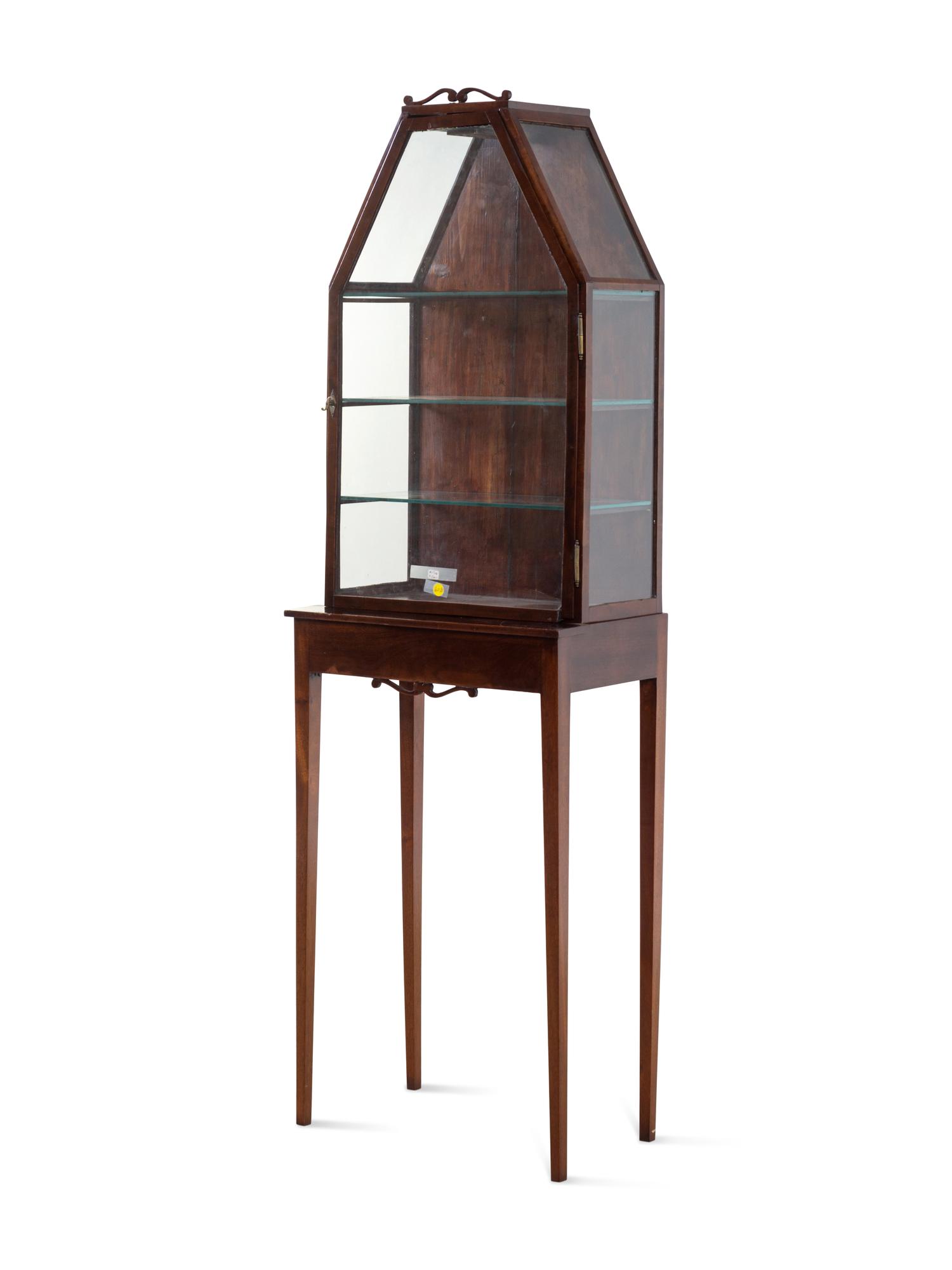 An English Mahogany Vitrine on Stand