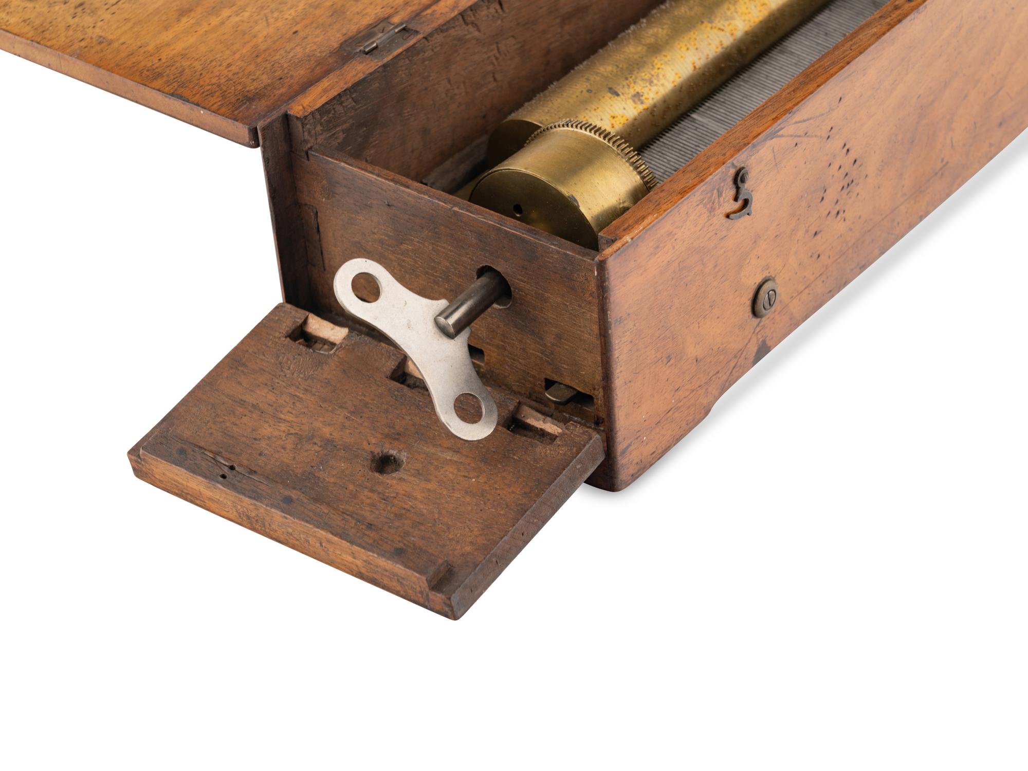 A Key Wind Four Air Music Box