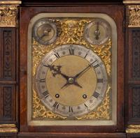 A Victorian Gilt Metal Mounted Oak Bracket Clock