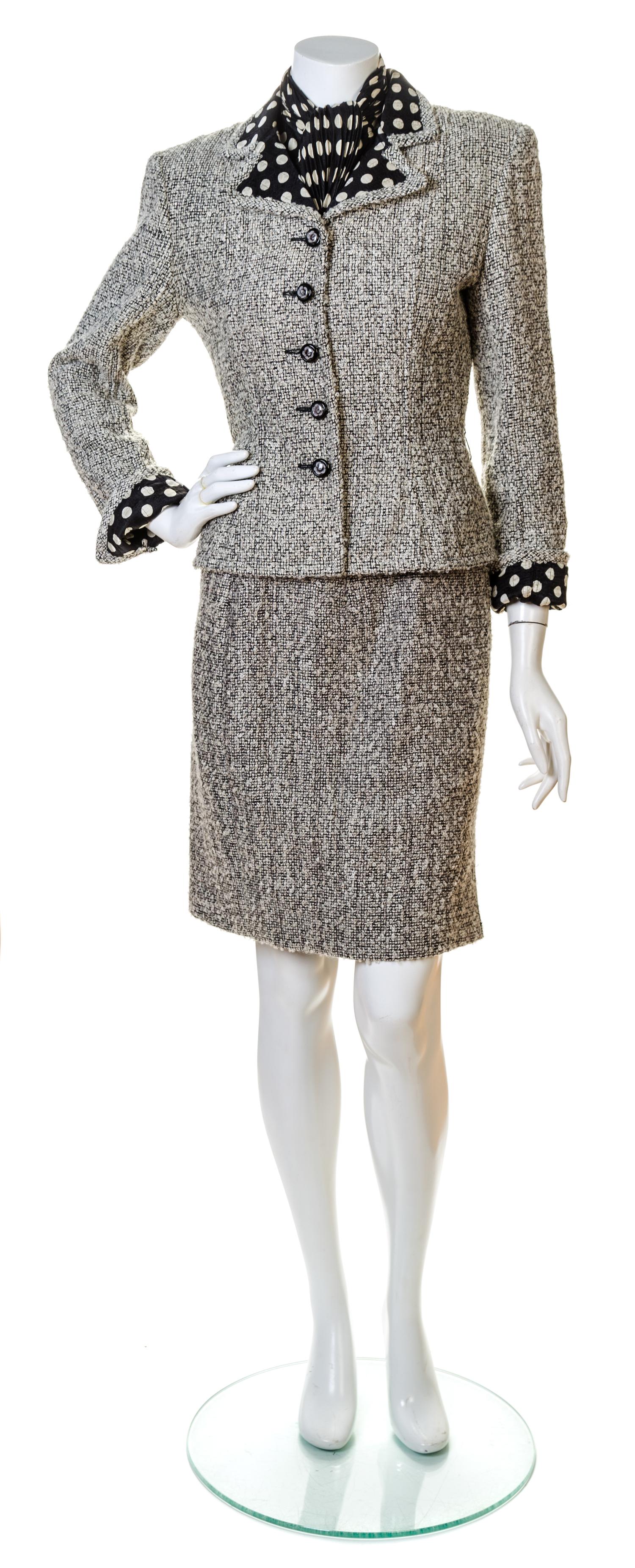 An Emanuel Ungaro Boucle Skirt Ensemble, Suit size 8, Blouse size 6.