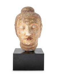 A Cambodian Style Painted Stone Head of Buddha