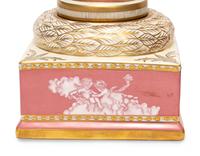 A Pair of Porcelain Urns