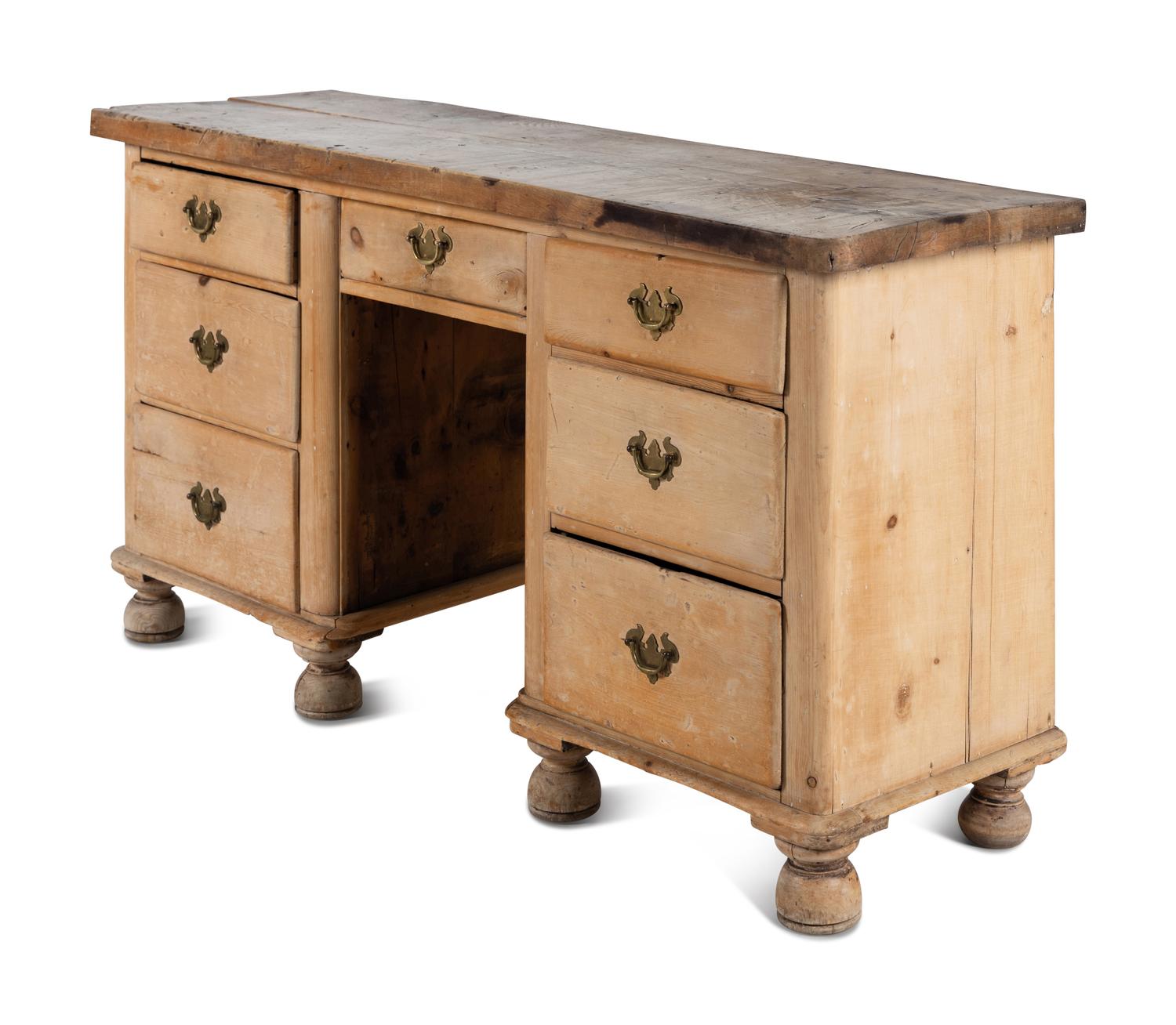 An English Pine Kneehole Dresser