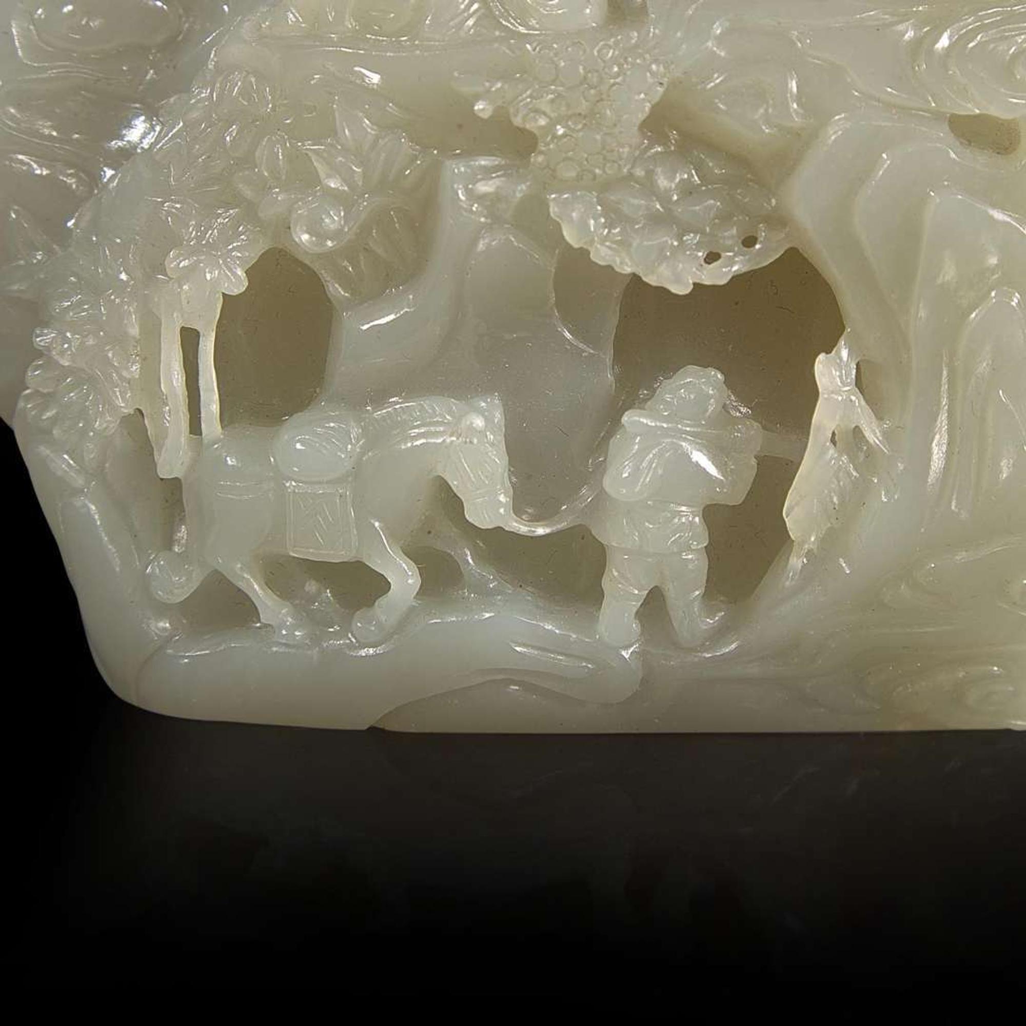 A small Chinese carved celadon-grey jade "mountain" 青灰玉山子 20th century ????