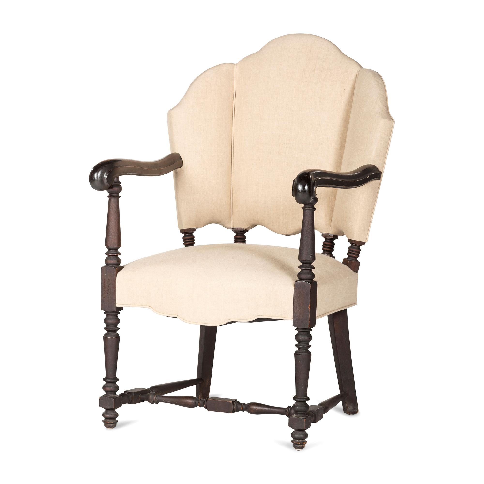 A William IV Carved and Turned Walnut Stretcher Base Library Armchair