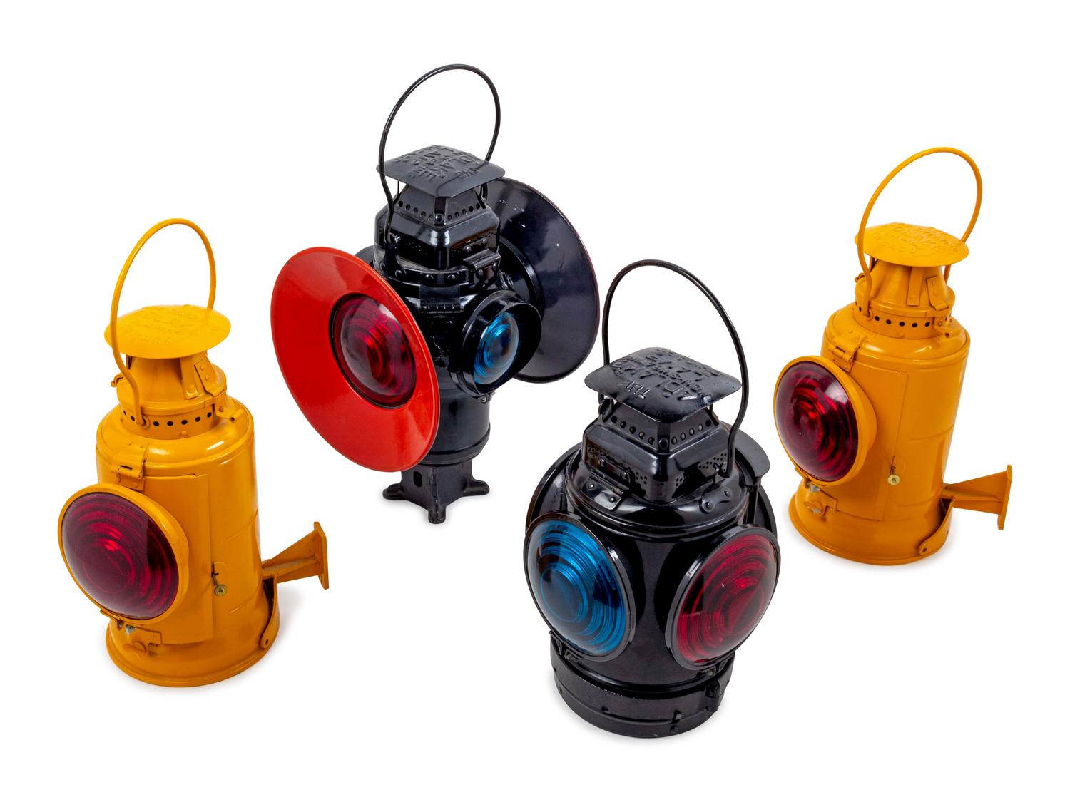A Group of Four Painted Metal Adlake: Non-Sweating Railroad Lanterns