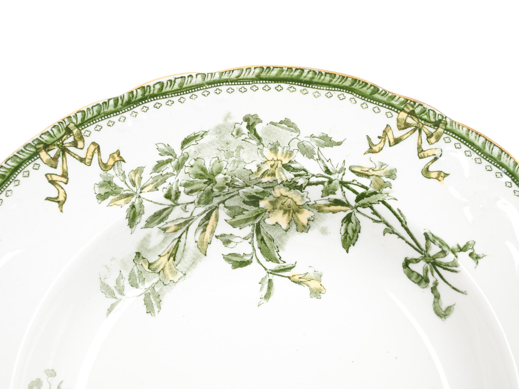 A Set of Twelve Royal Doulton Porcelain Soup Plates