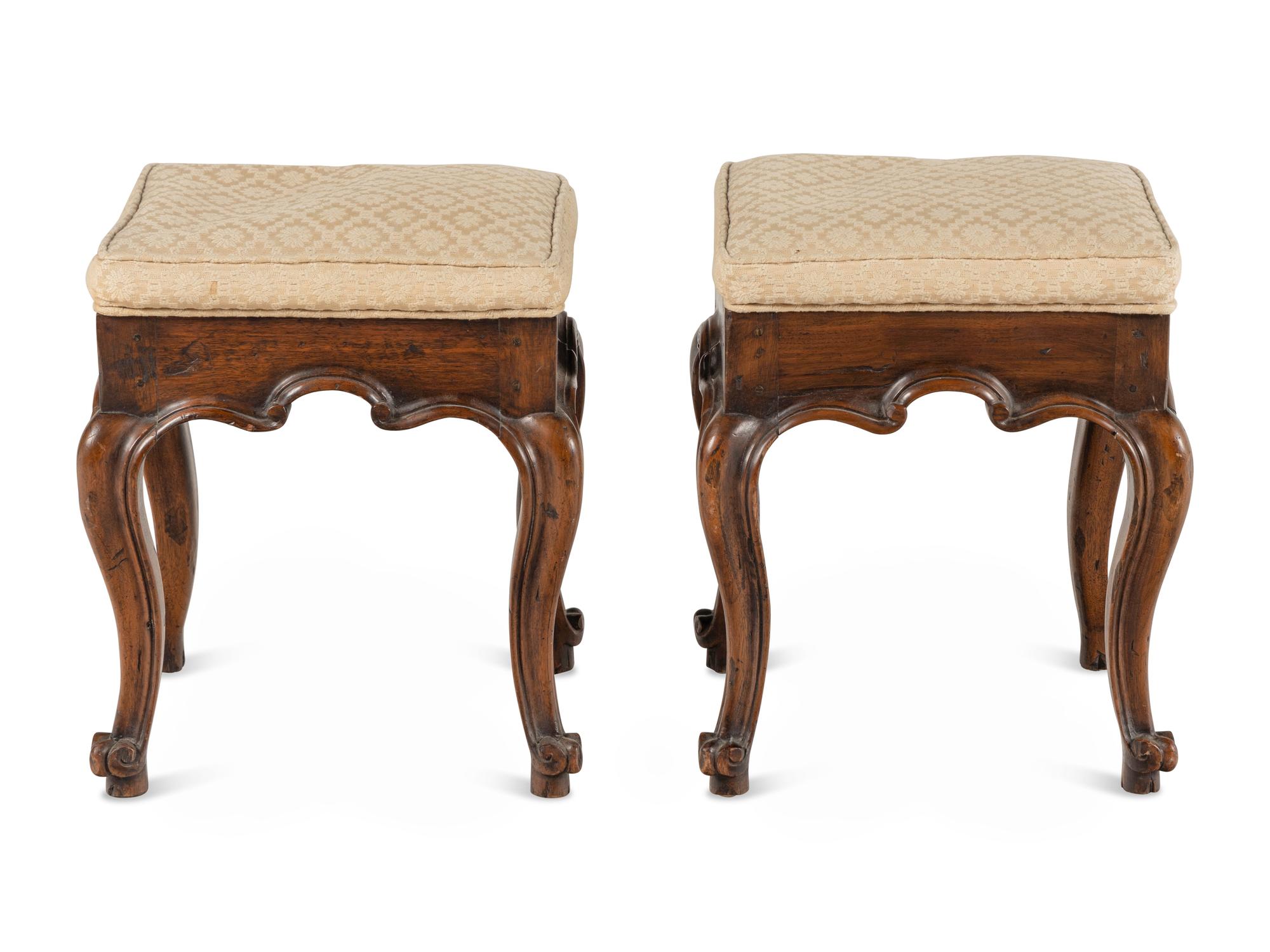 A Pair of Italian Carved Walnut Tabourets