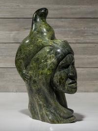 stone sculpture, woman and seal
