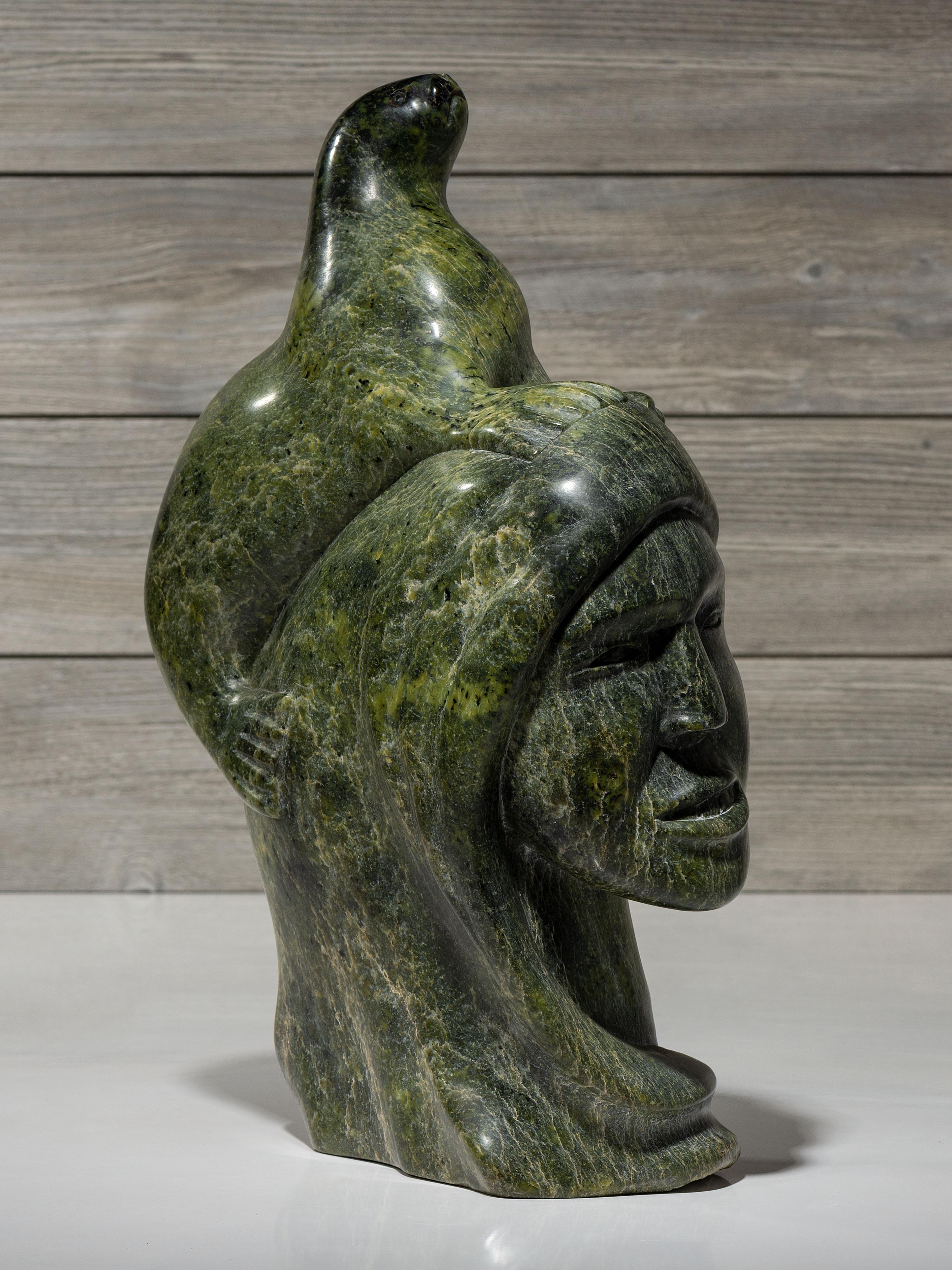 stone sculpture, woman and seal