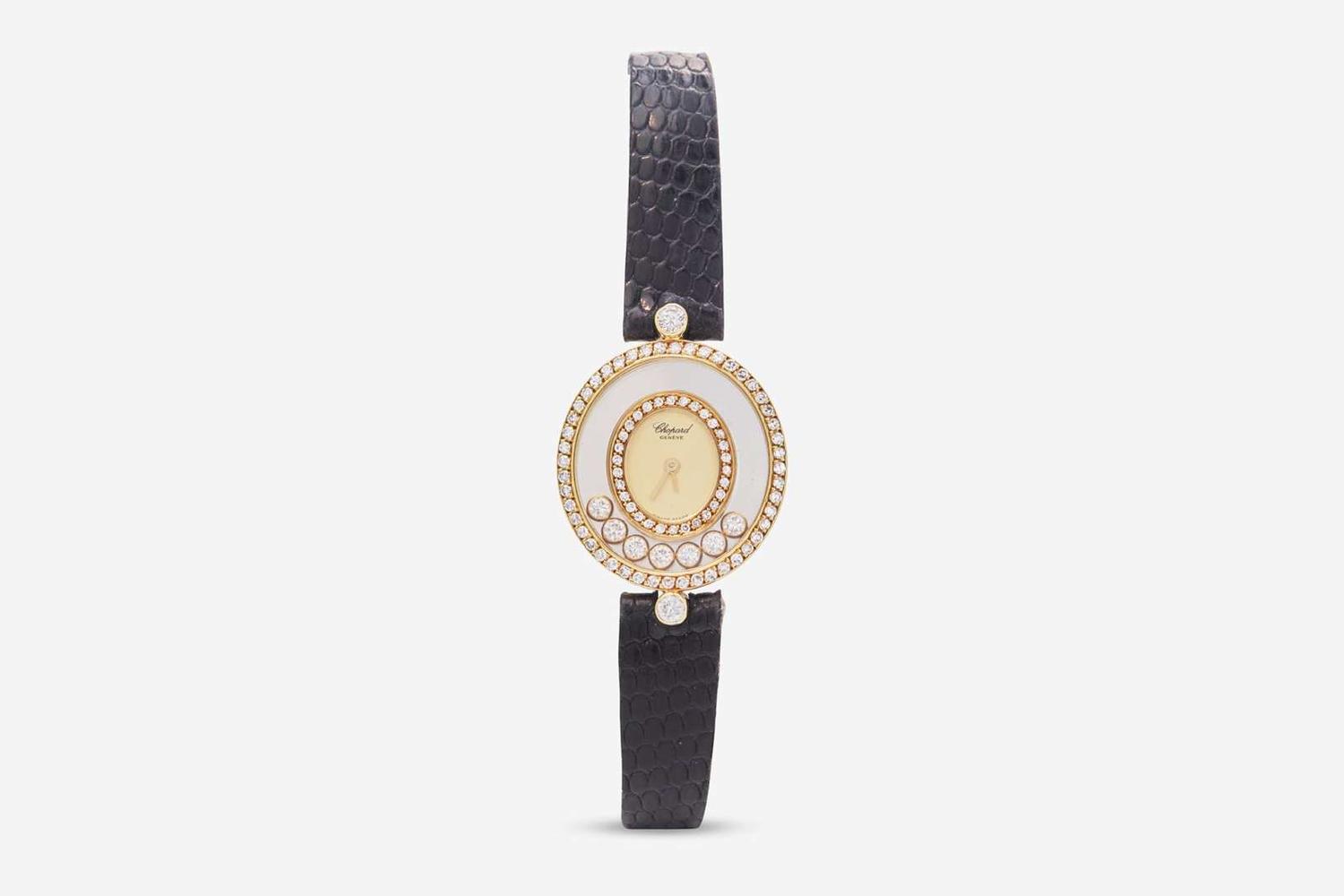 An 18K Yellow Gold Happy Diamonds Ladies Watch by Chopard