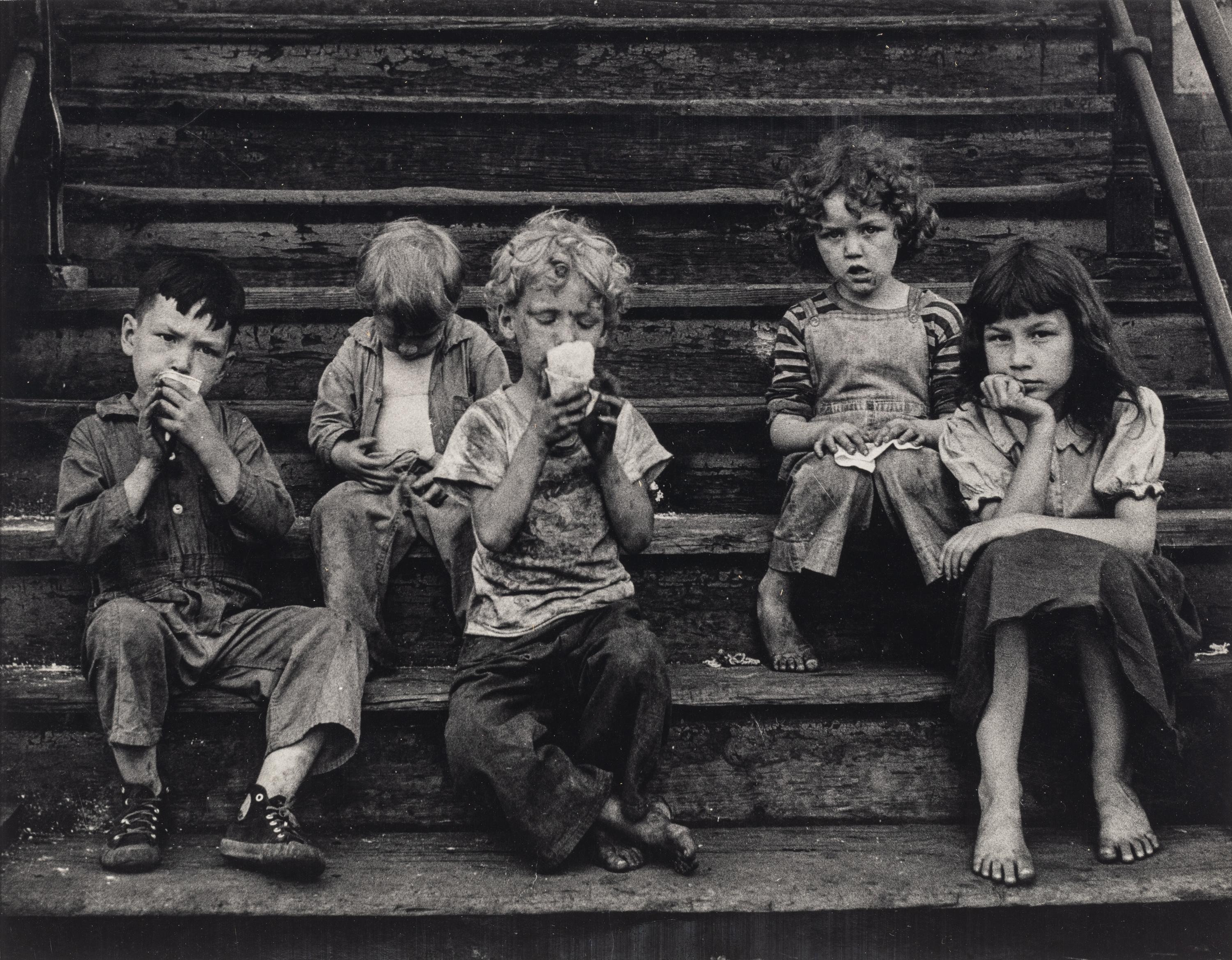 Yasuhiro Ishimoto (1921-2012) Untitled (Children on Stoop, Chicago), 1951-1952