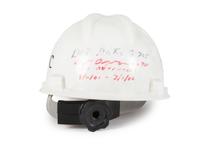[FLAGS]. A group of items related to the recovery efforts at Ground Zero after September 11, 2011, incl. a helmet worn at the site by retired NYC Detective Arthur Giammarino as he assisted in the recovery efforts.