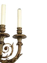 A Pair of Louis XVI Style Gilt Metal Three-Light Sconces