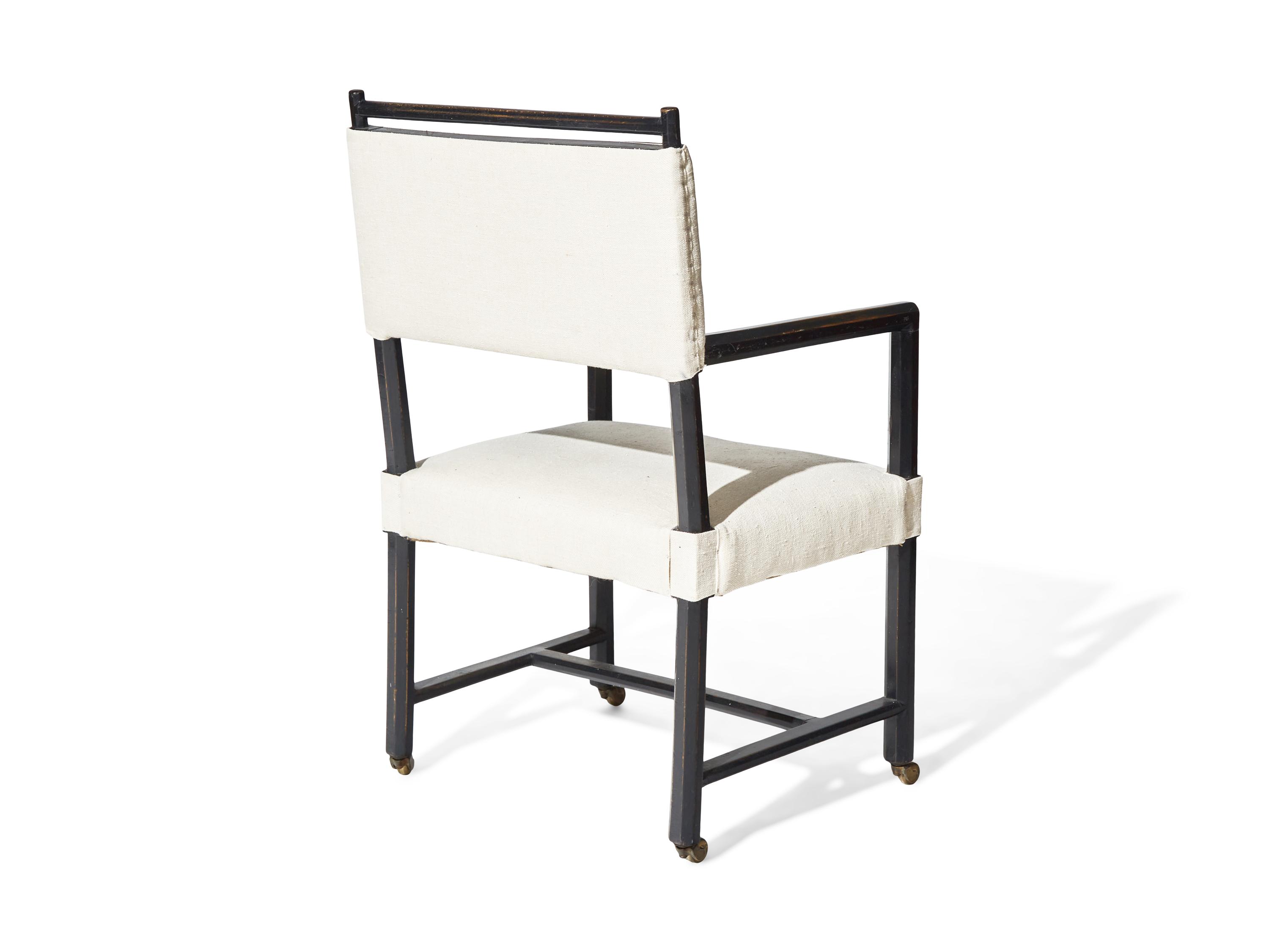 A Black Satin-Finish and Upholstered Armchair In the Manner of Edward Wormley DONATED BY BILLY COTTON