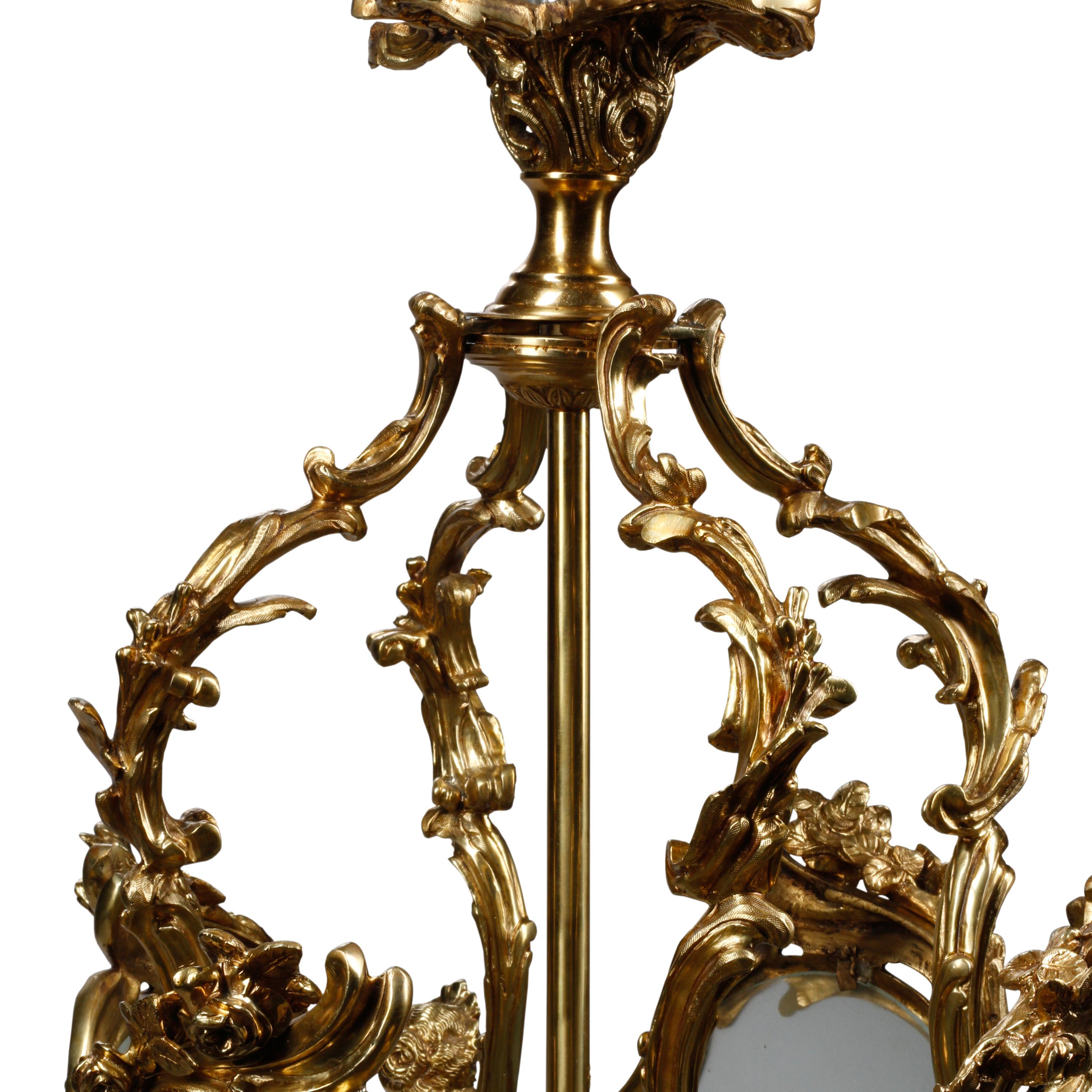 A Pair of Louis XV Style Gilt Bronze and Etched Glass Hall Lanterns