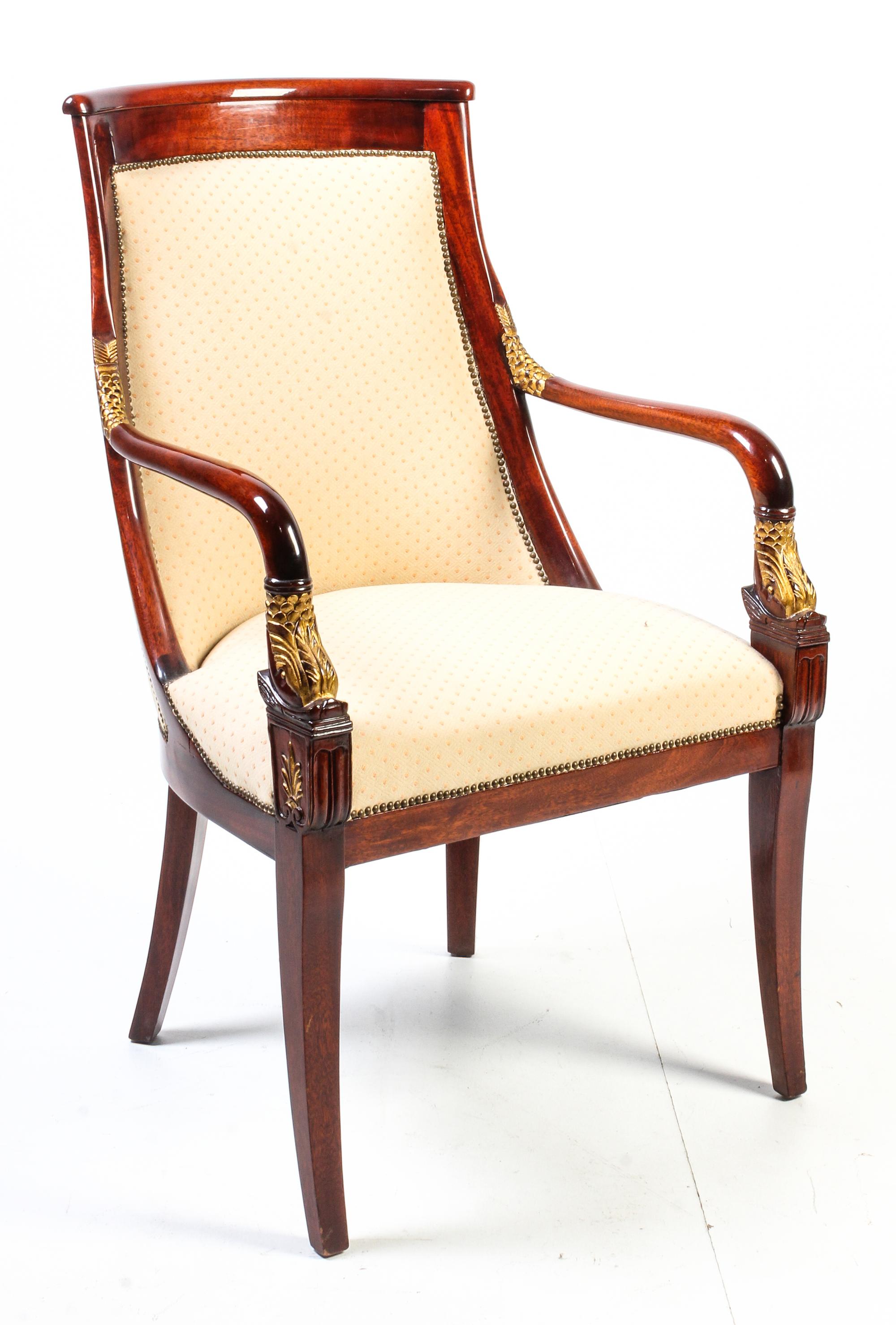 An Empire Style Parcel Gilt Fauteuil Height 39 1/2 inches. — 20TH CENTURY