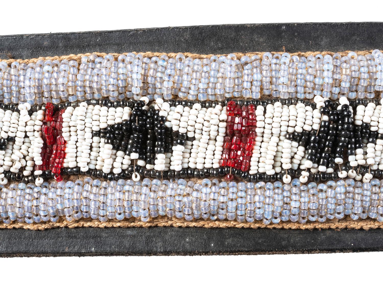Collection of Plateau Belts, Gauntlets, and Armbands