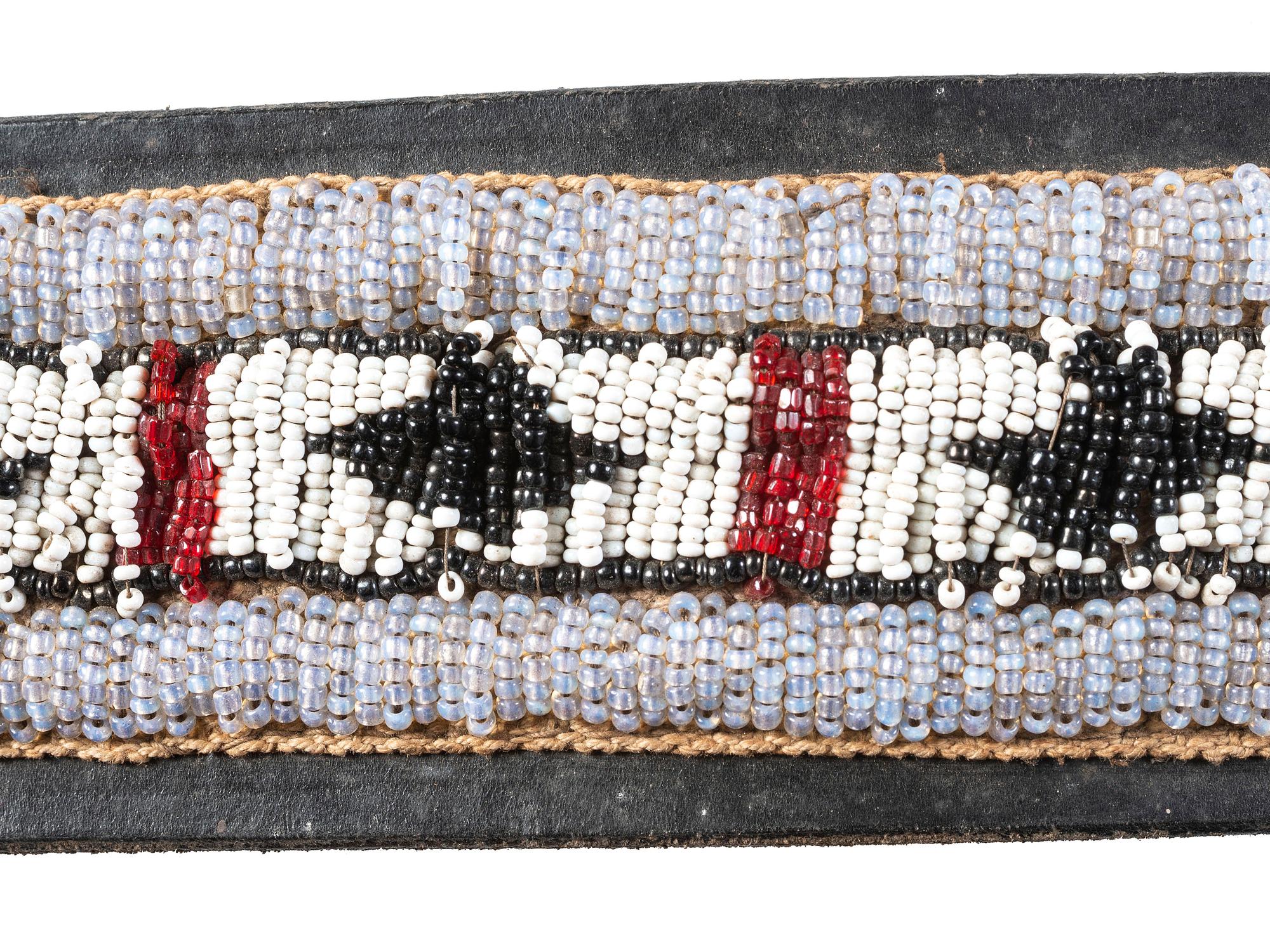 Collection of Plateau Belts, Gauntlets, and Armbands