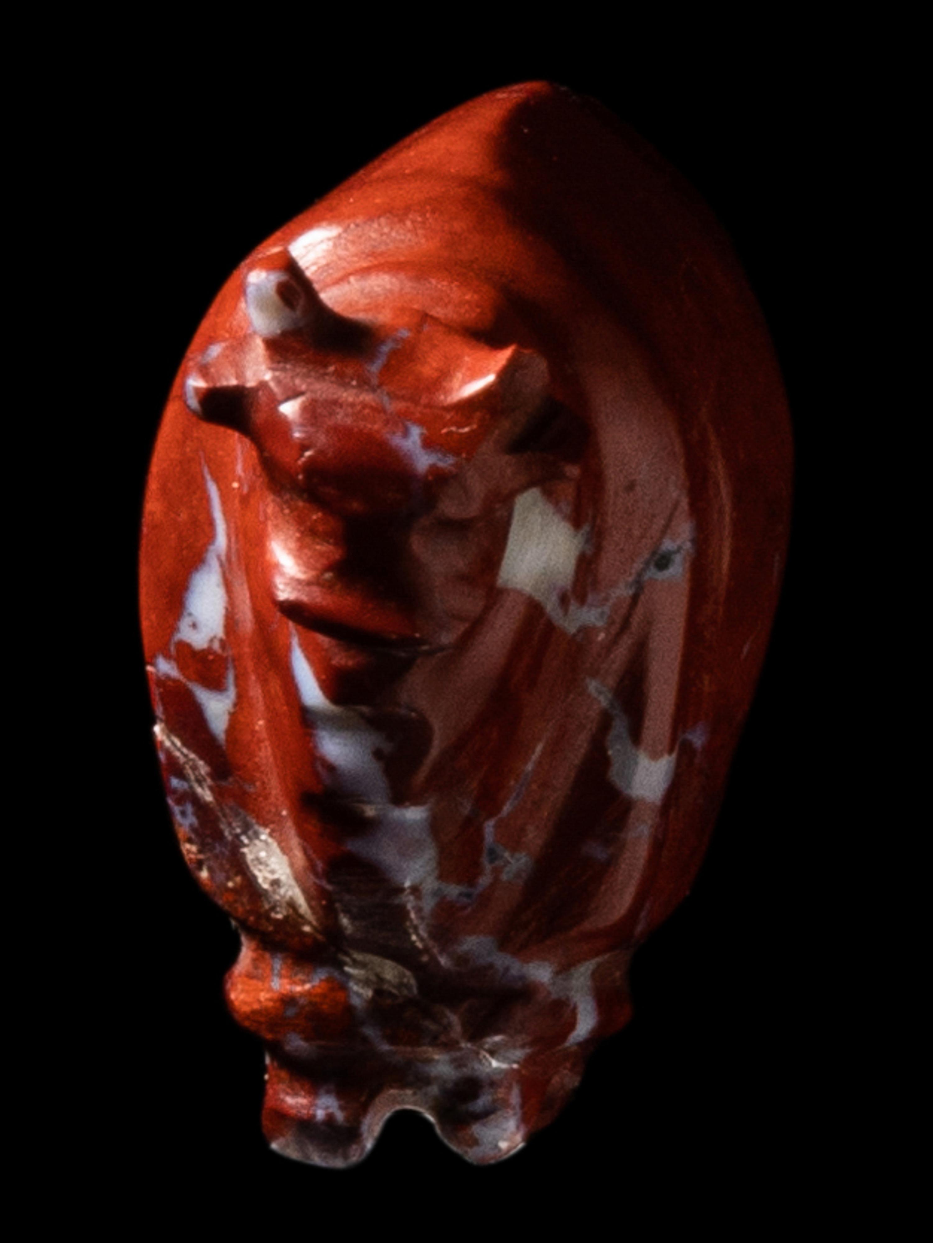 An Egyptian Red Jasper Trussed Ox