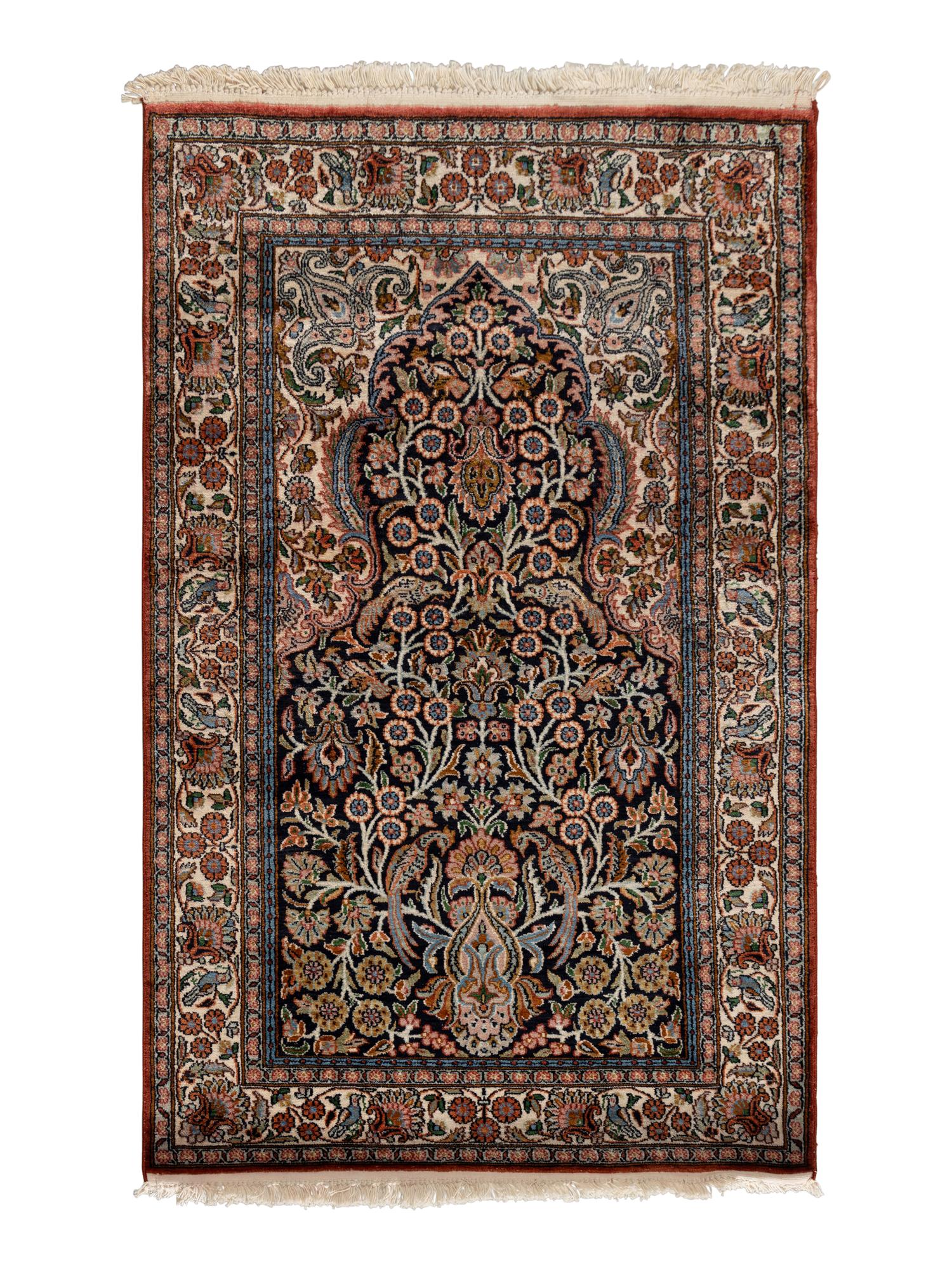 An Indo-Qom Silk Rug