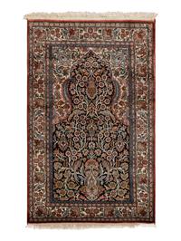 An Indo-Qom Silk Rug