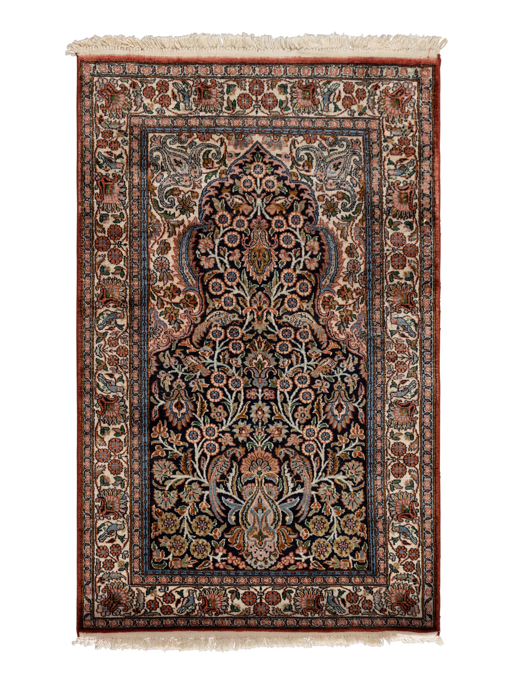 An Indo-Qom Silk Rug