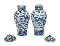 A Near Pair of Chinese Porcelain Covered Vases
