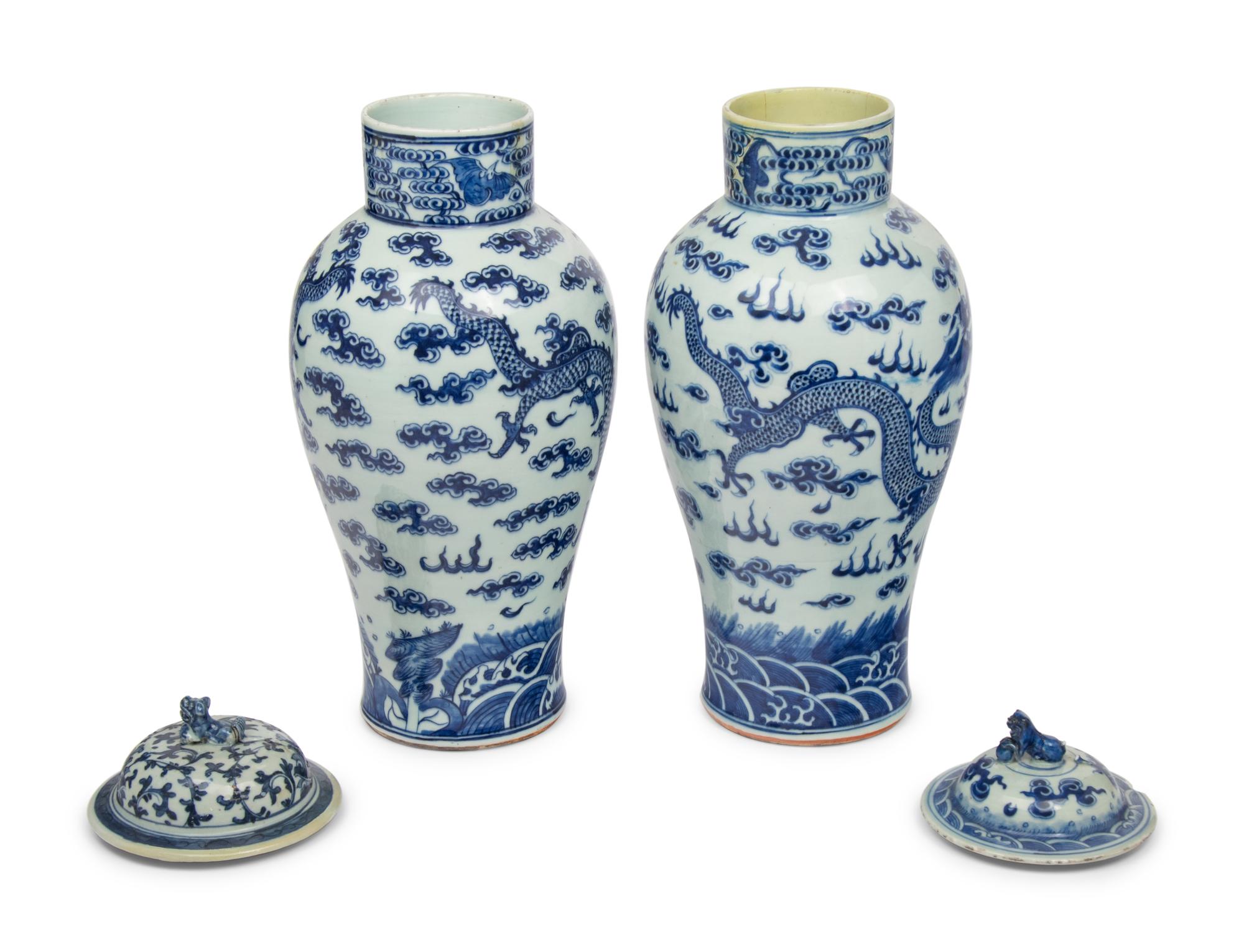 A Near Pair of Chinese Porcelain Covered Vases