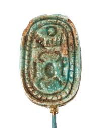 An Egyptian Faience Swivel Scarab