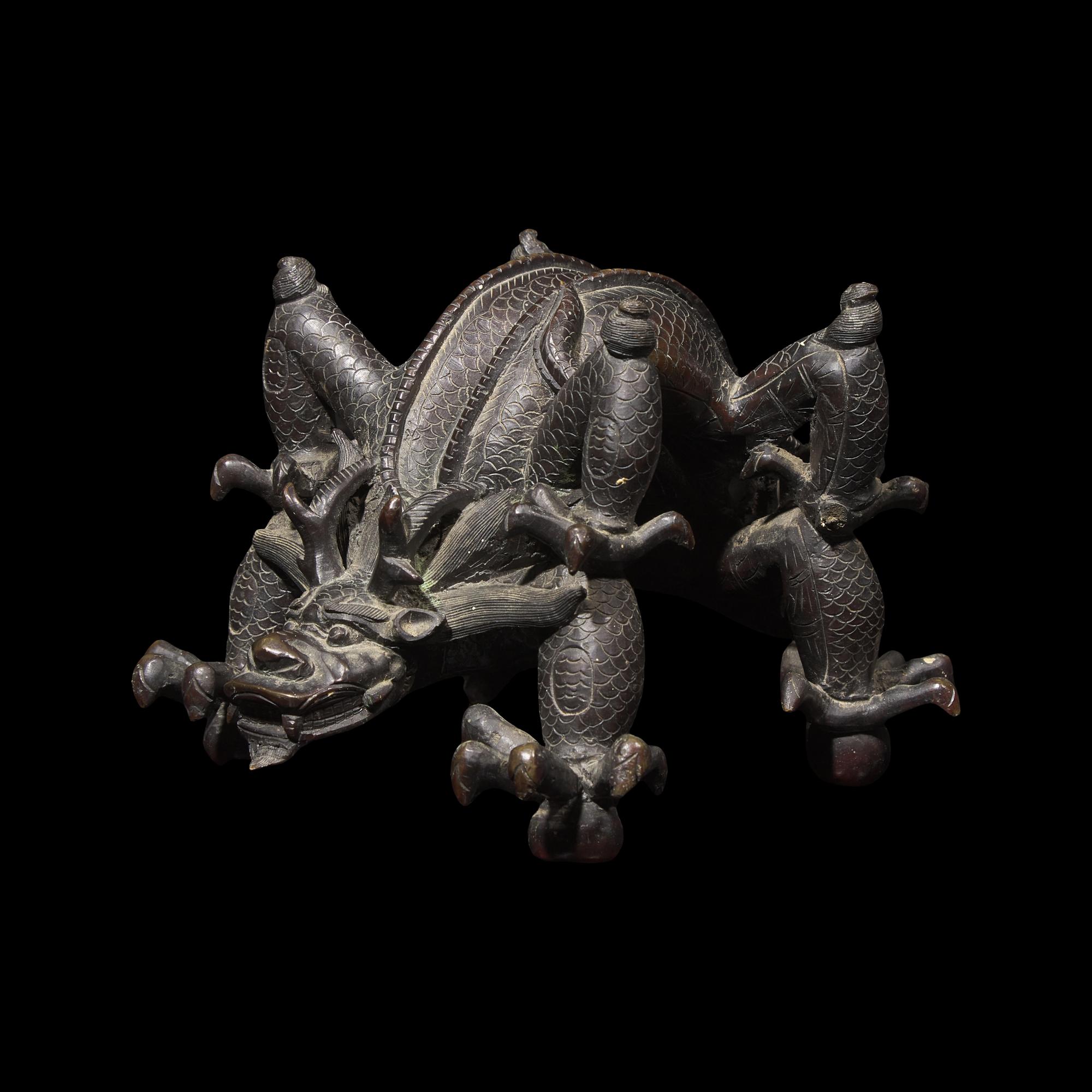 A Chinese Patinated Bronze Double Dragon Stand, Late Qing Dynasty 清晚期 青銅龍形座