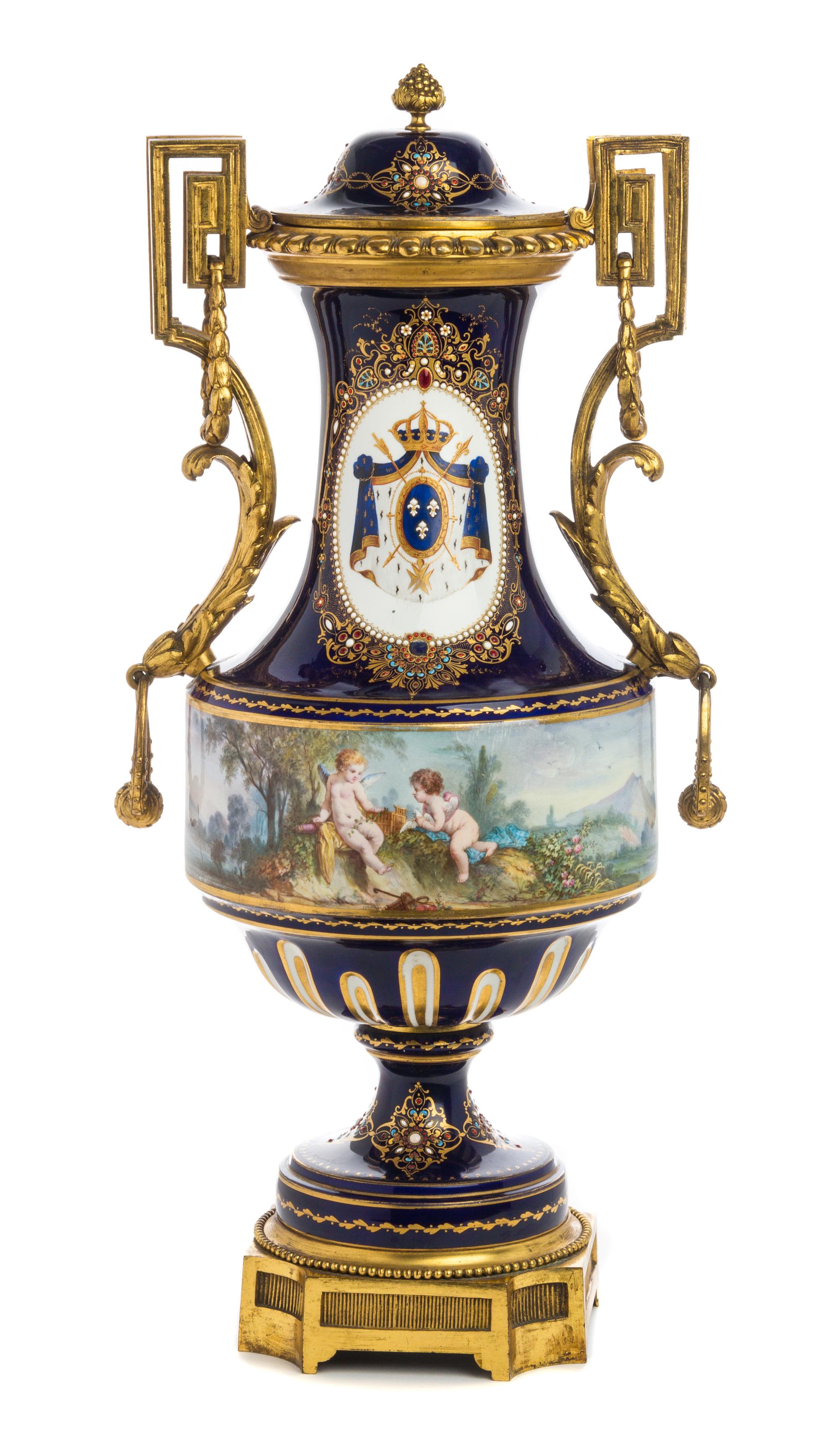 A Gilt Bronze Mounted Sevres Style Jeweled Porcelain Covered Urn Height 24 inches. — 19TH/20TH CENTURY