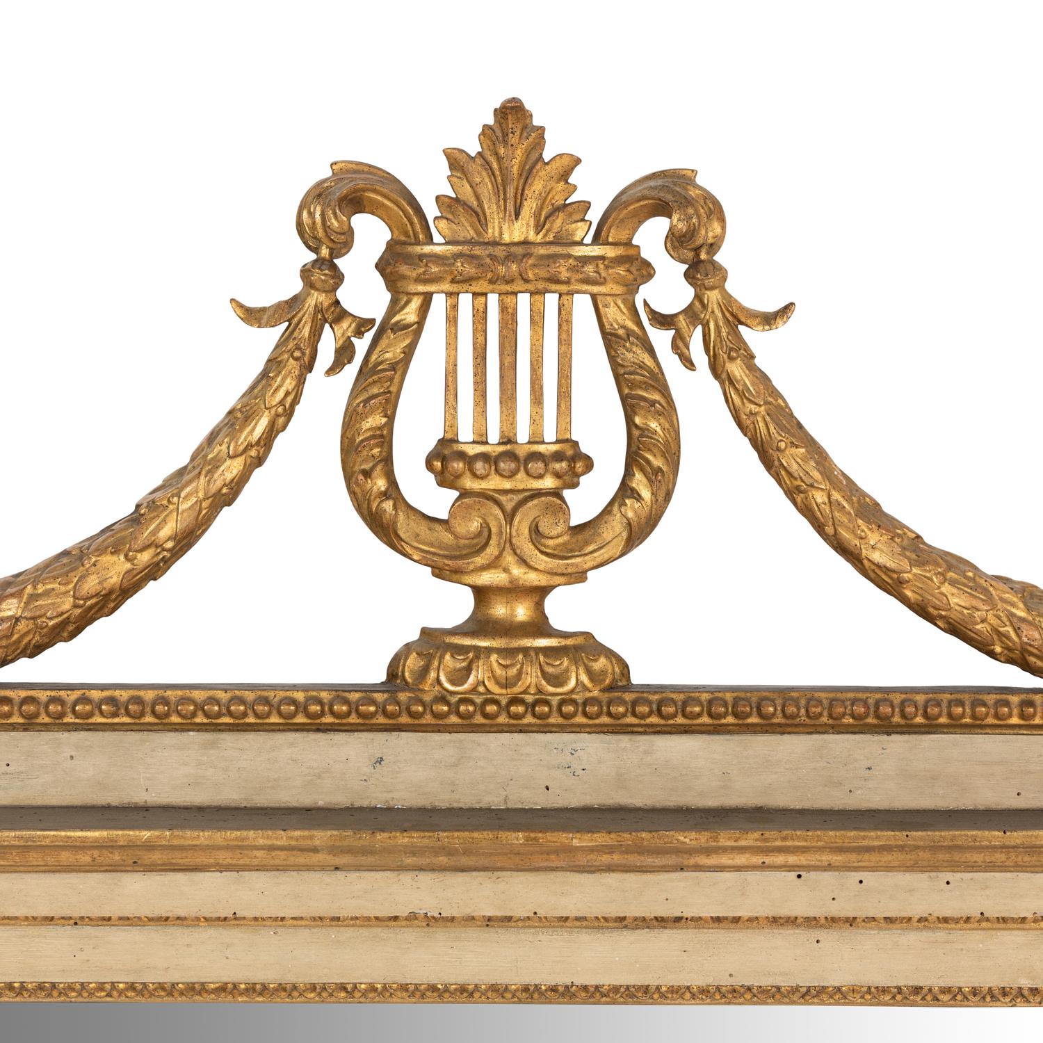 An Italian Neoclassical White Painted and Giltwood Mirror