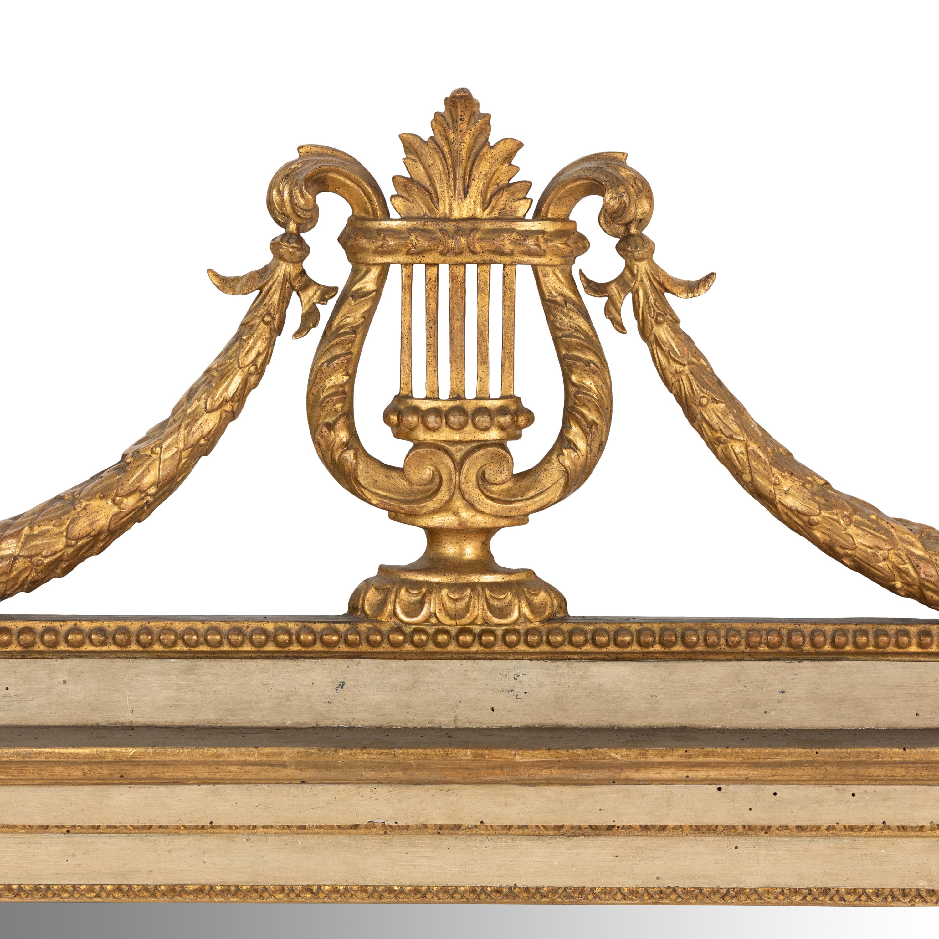 An Italian Neoclassical White Painted and Giltwood Mirror