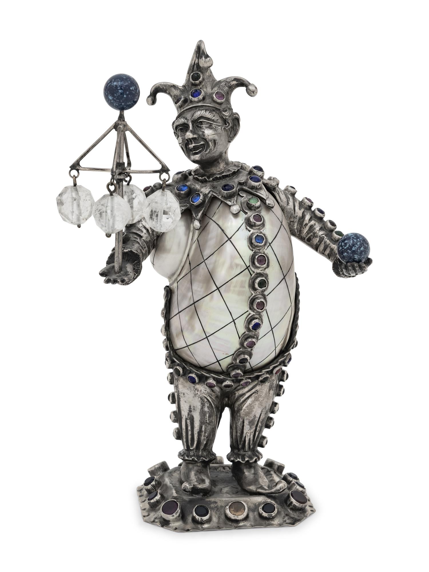 A German Silver and Jewel-Mounted Shell Figure of a Jester